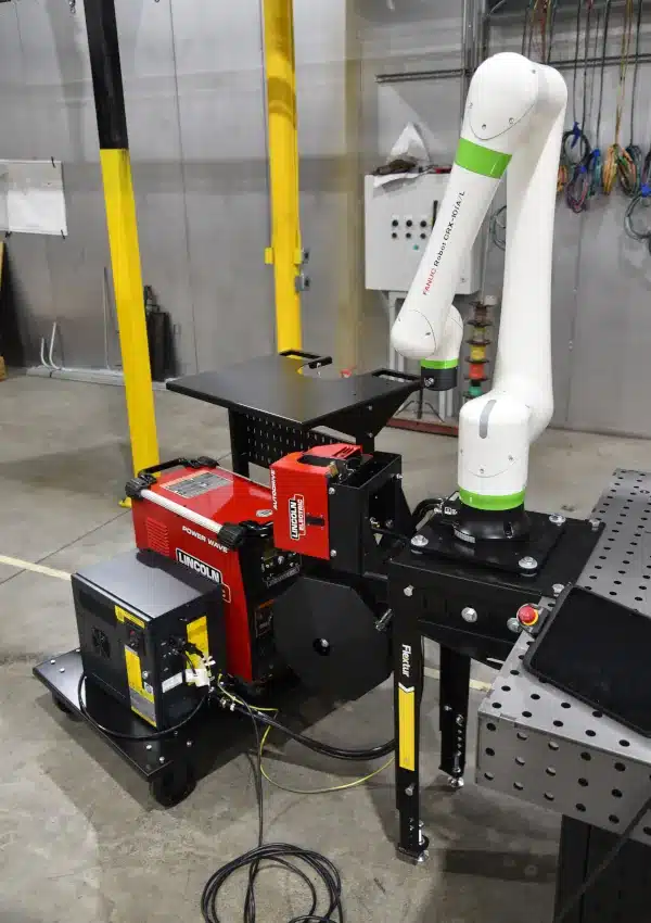 Fabtech 2024 Cobot arm with pedestal and cart.